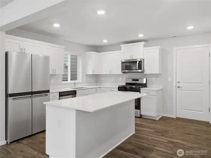 Kirchen view two, I love all the granite and that huge island! Great for entertaining and breakfast. Kirchen view two, I love all the granite and that huge island! Great for entertaining and breakfast.