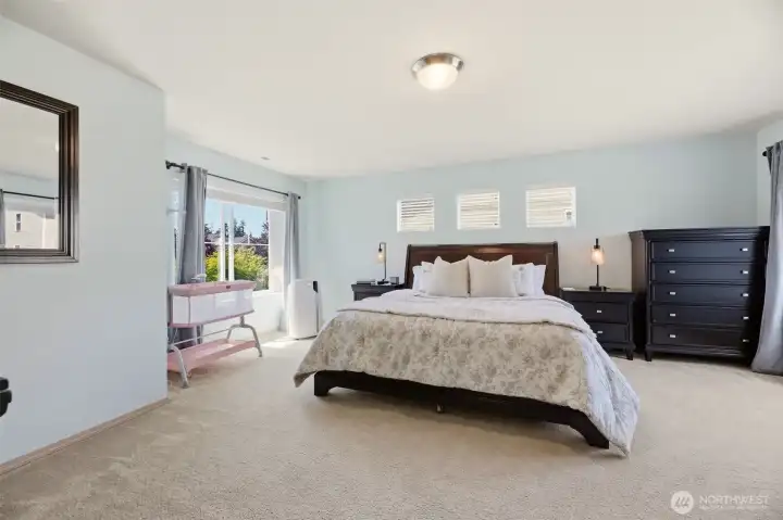 Relax and recharge. The spacious primary suite offers a peaceful retreat at the end of the day. Relax and recharge. The spacious primary suite offers a peaceful retreat at the end of the day.