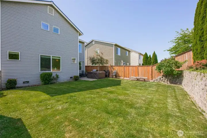 The fully fenced backyard provides room for pets, play, and entertaining. The fully fenced backyard provides room for pets, play, and entertaining.