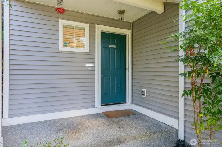 This covered front porch offers a welcoming place to greet family and friends. This covered front porch offers a welcoming place to greet family and friends.