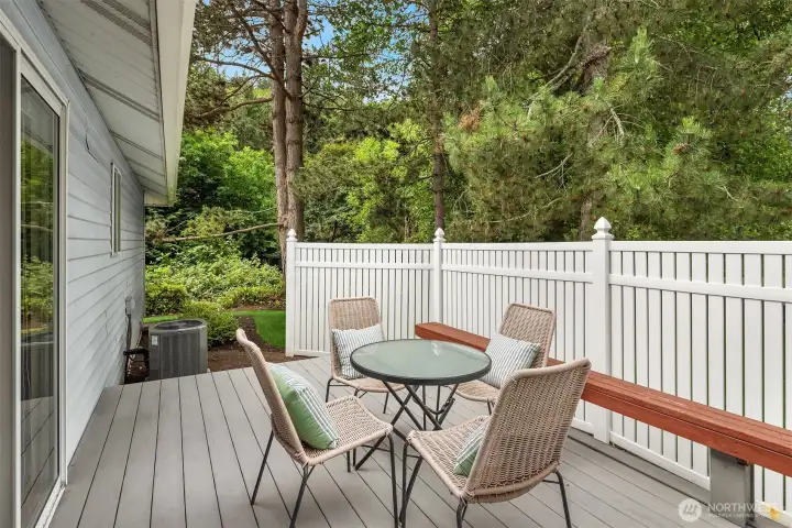 Generous deck overlooks park-like setting Generous deck overlooks park-like setting