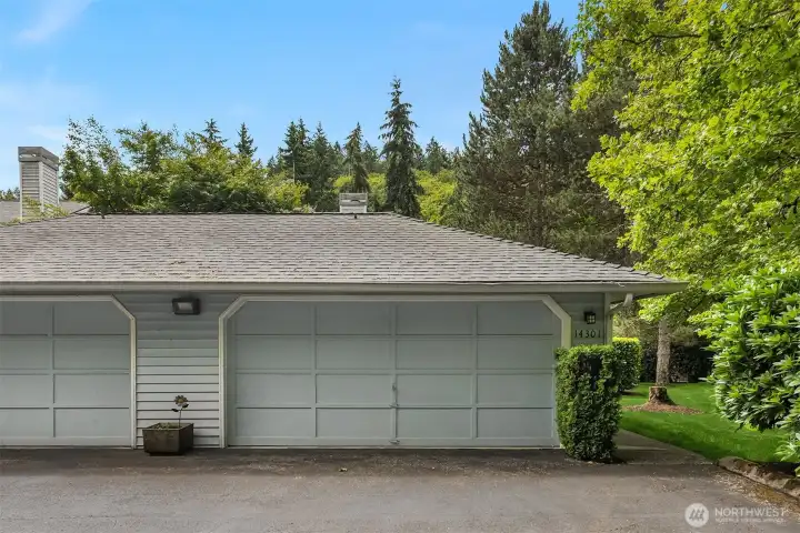 Two-car garage has extra storage and workbench for handy person. Enter condo from the walkway on the right of garage. Two-car garage has extra storage and workbench for handy person. Enter condo from the walkway on the right of garage.