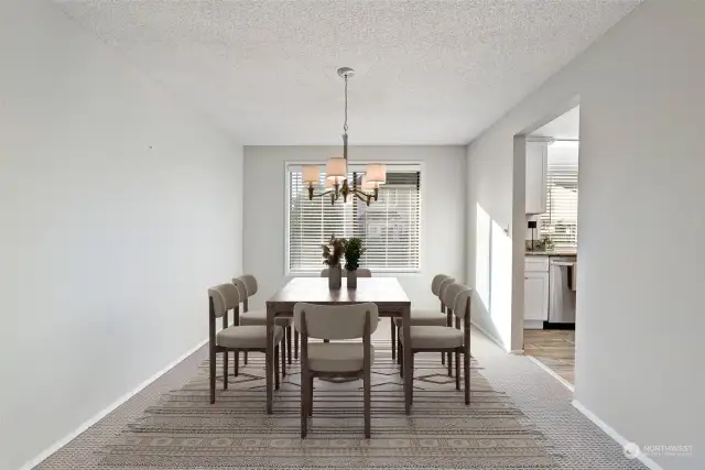 The dining room is centrally located to the kitchen and living room.