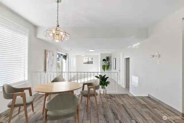 The breakfast nook, flowing to the spacious family room.