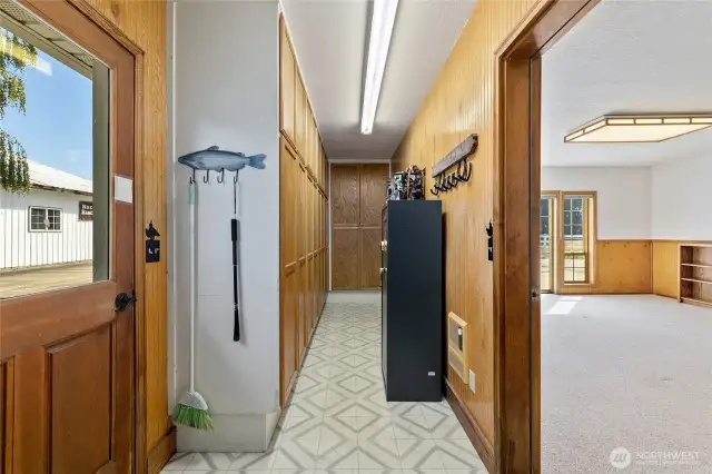 Mechanical room and storage off of the bonus room. It is full of pantry cupboards so there is storage for everything from winter gear to Costco stock up supplies - it all fits!