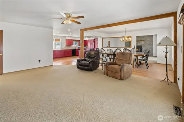 The family room off the dining and kitchen is another great space to hang out!  There are doors to the back deck and yard!