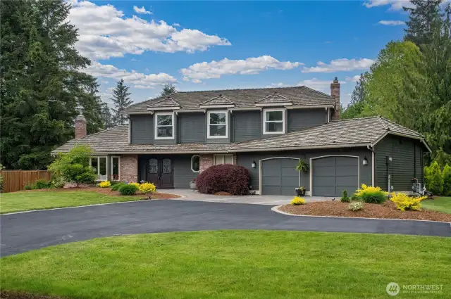 Beautifully updated Brook Trails home positioned on a sun drenched lot and designed for indoor / outdoor entertaining.