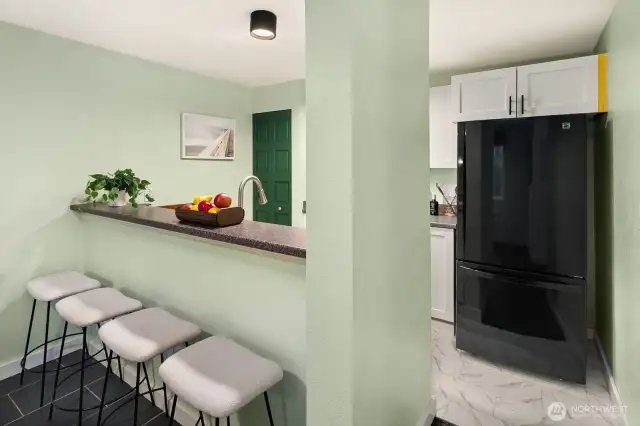 Open living/dining/kitchen w/ slider opening to patio & yard space