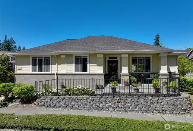 This pristine Orchard plan home has been exquisitely maintained and is in perfect condition. The wrought iron fence is the front is a nice architectural feature. Lots of place for container gardening!