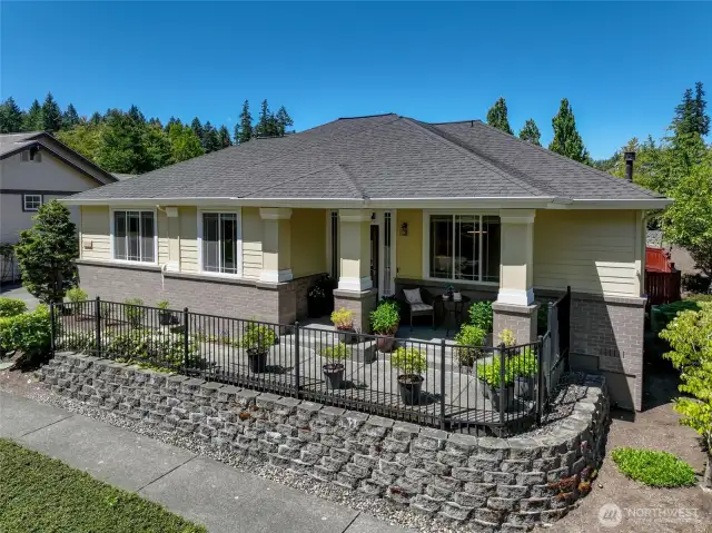 An expansive covered front porch is a nice place to enjoy your morning coffee.