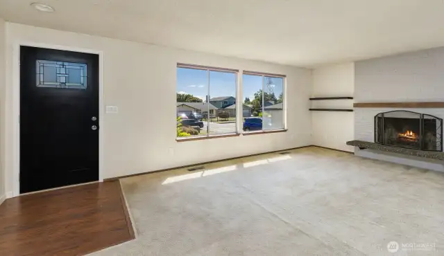 Living room with wood burning fireplace