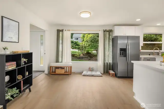 With tons of Natural Light & Gorgeous LVP Floors