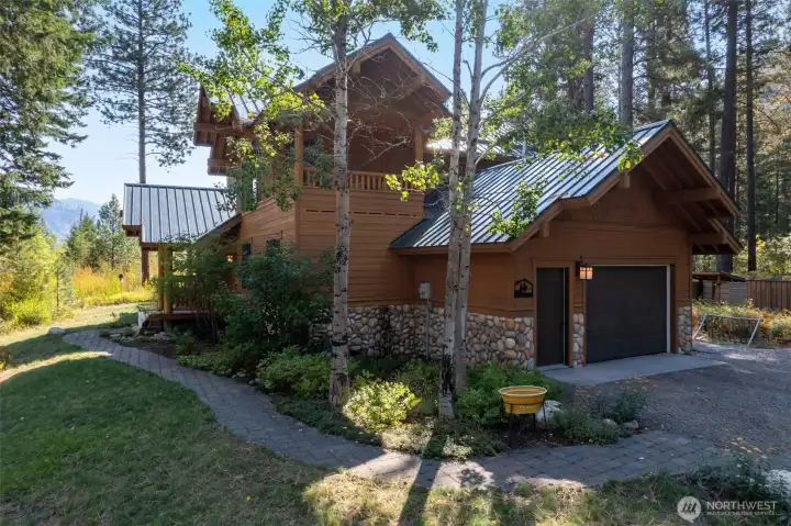 Proximity to USFS land, giving privacy, scenic views, and trails right off your property.  Attached 1.5 car garage, small work bench, extra storage, hot water tank, forced air furnace, Heat pump around back of house.