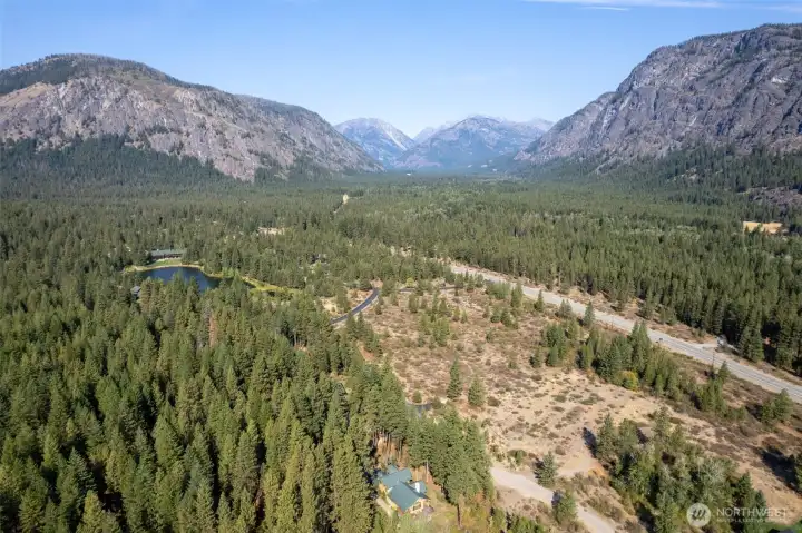 Direct access to trails—both walking and biking trails; and skiing trails in winter. Peaceful 1.09-acre setting bordered by U.S. Forest Service land.
