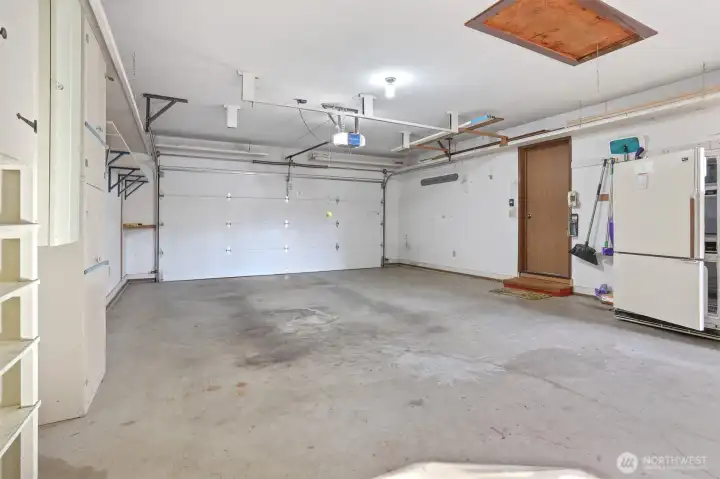 2 car attached oversized 560 sq ft (SCR) garage/workshop.