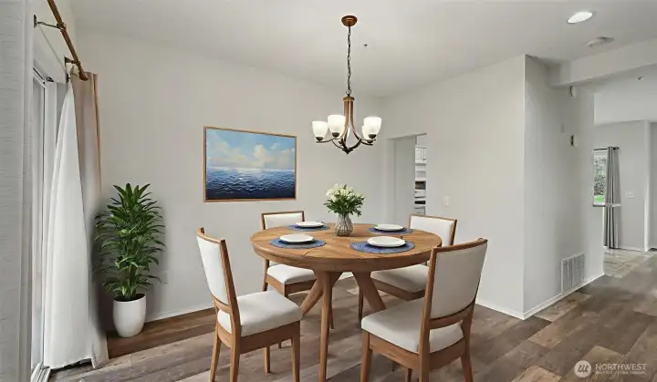 Large dinning room large enough for vanity, table and 8 chairs