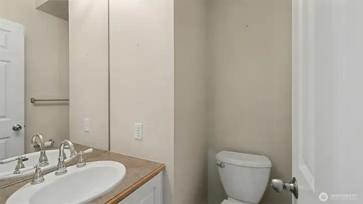 Powder room centrally located on main level.