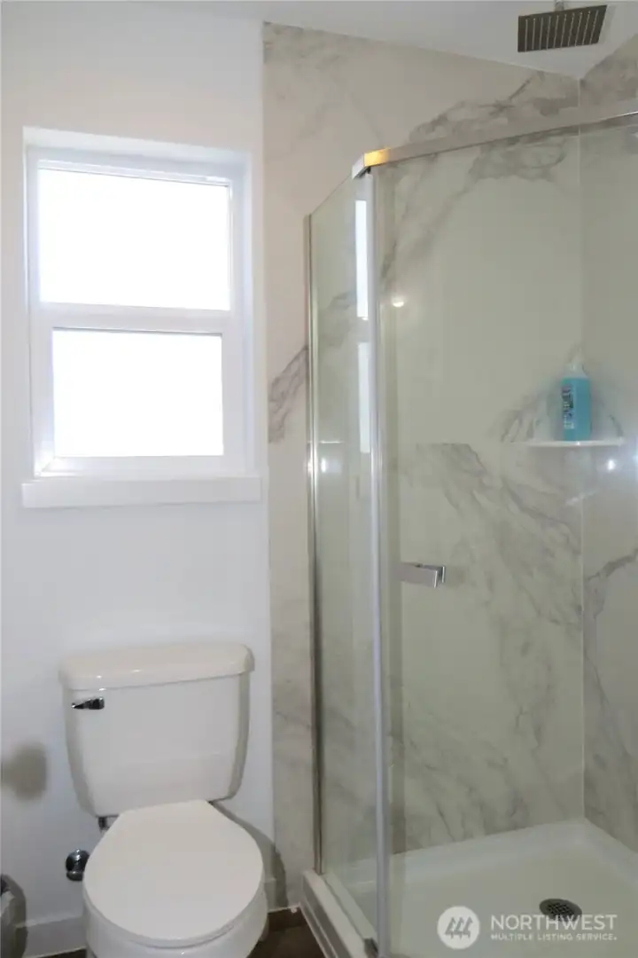 SECOND LEVEL BATHROOM WITH ANOTHER 3/4 STEP-IN SHOWER!