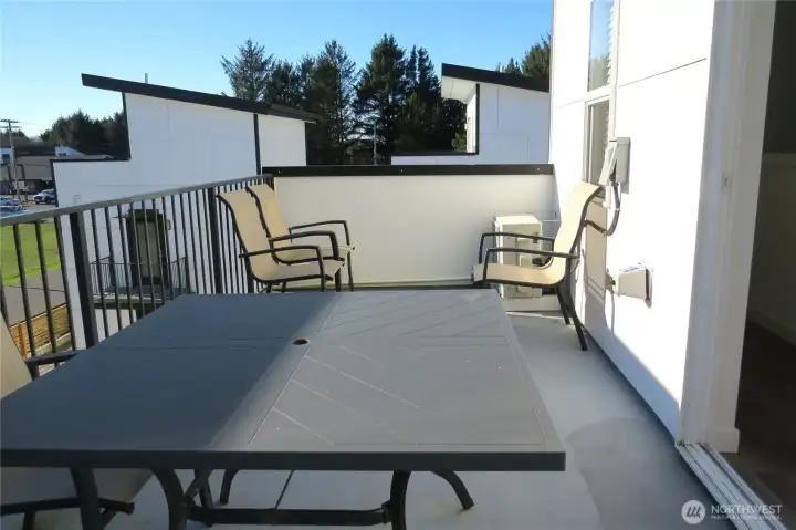 STEPPING OUT THE THIRD LEVEL FOR A FULL SIZED BALCONY!  ENJOY BARBEQUES WHILE WATCHING THE ACTIVITIES OF OUR BEACH TOWN OF OCEAN SHORES!