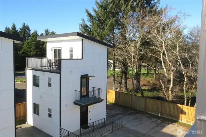 THIRD LEVEL VIEW FROM THE BALCONY OF ANOTHER COTTAGE IN THE UNITS!  REMEMBER YOU CAN LIVE HERE FULL OR PART TIME OR USE AS AN INVESTMENT PROPERTY OF NIGHTLY RENTAL OR AIRBNB!