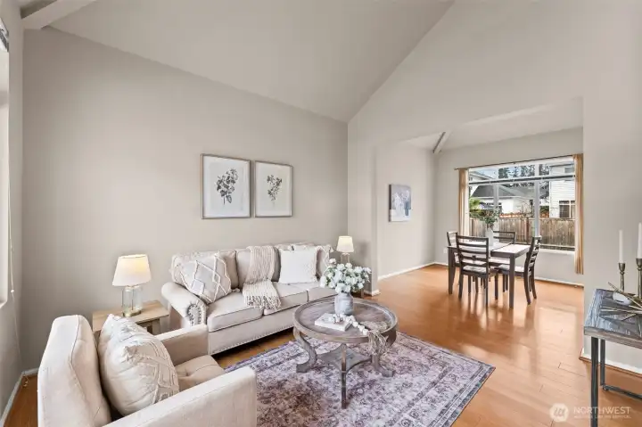 Effortless Connectivity. The open-concept layout bridges the formal living room and dining area, making it an entertainer's dream. Whether hosting a dinner party or enjoying a quiet evening, the fluid transition between rooms ensures you never miss a moment.