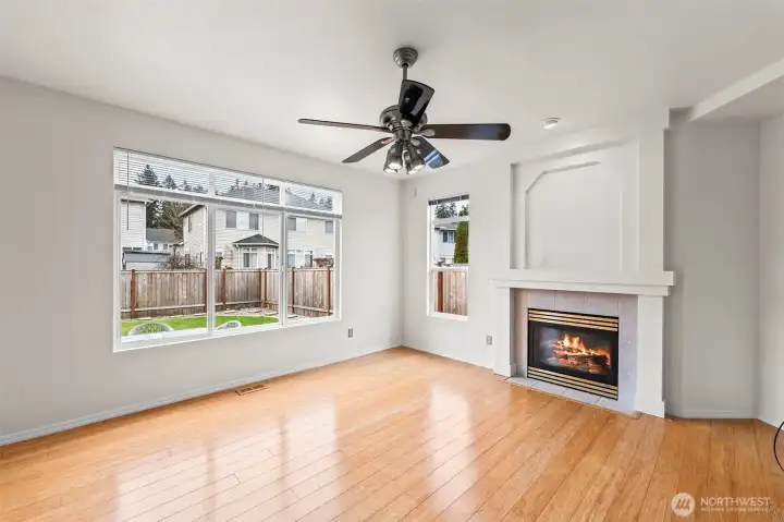 Cozy Evenings Await. The secondary living area features a stunning gas fireplace with a classic white mantel, serving as a beautiful focal point. Whether it’s a rainy afternoon or a festive holiday gathering, this space offers a warm and inviting atmosphere.