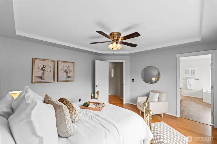 Suite Living. The primary bedroom is designed for convenience and style, featuring direct access to a spa-like ensuite bathroom. The walk-in layout and generous proportions ensure you have all the space you need to start and end your day in comfort.