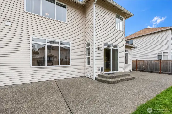 Outdoor Entertainment. Step out to the expansive aggregate concrete patio, perfect for summer BBQs and alfresco dining. The low-maintenance exterior and private yard make outdoor living easy and enjoyable.