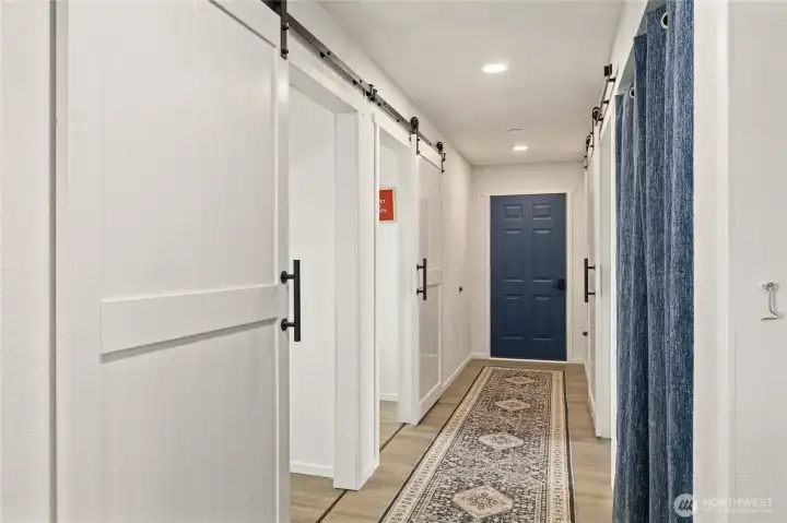 Hallway with linen closet at the end.