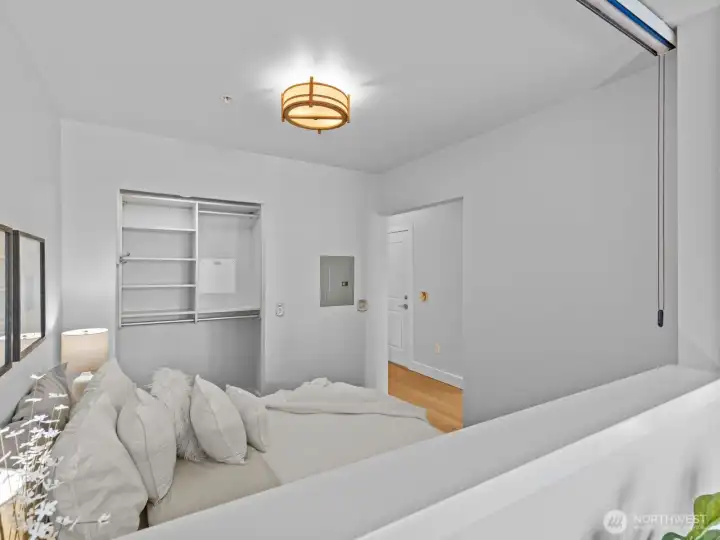 The walk-in closet features a California closets closet system for maximum storage.