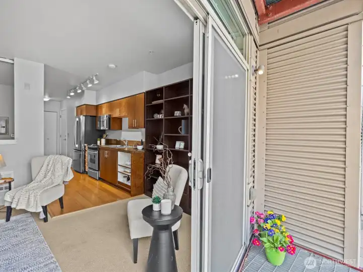 Slide open the balcony door for fresh air.