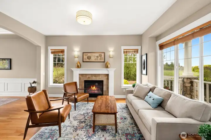 Warm and inviting living area off entry with lots of natural light and beautiful Mt. Rainier Views!
