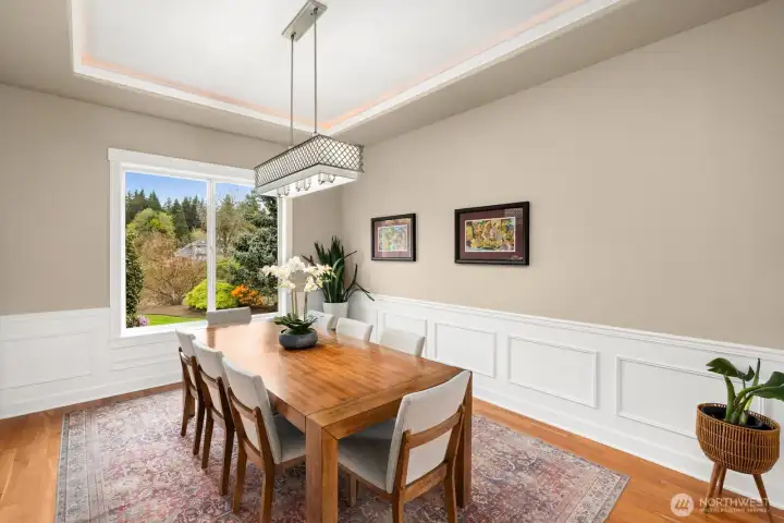 Dining room with beautiful and private backyard views.