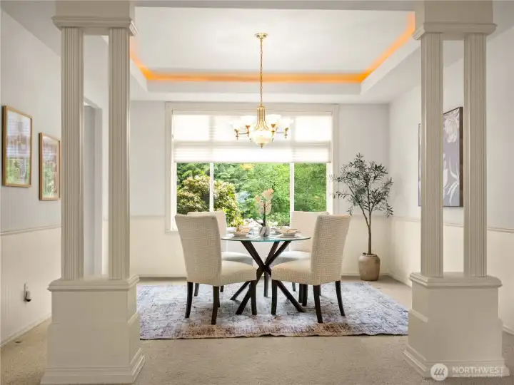 Dining room with regal pillars.