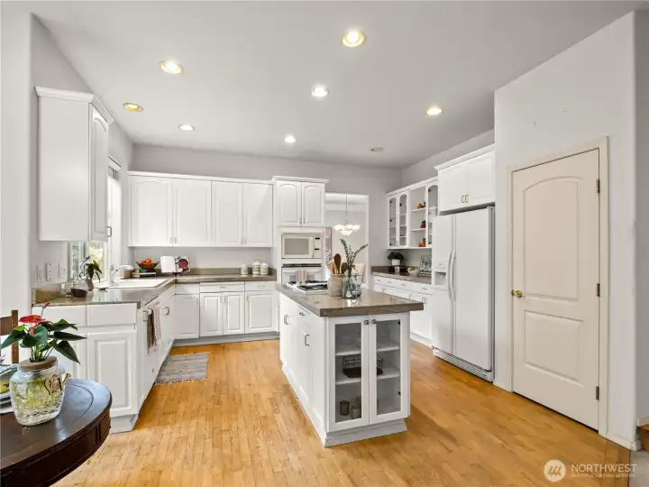 This kitchen has ample storage and counterspace to work on. The large walk-in pantry is conveniently located in the kitchen.