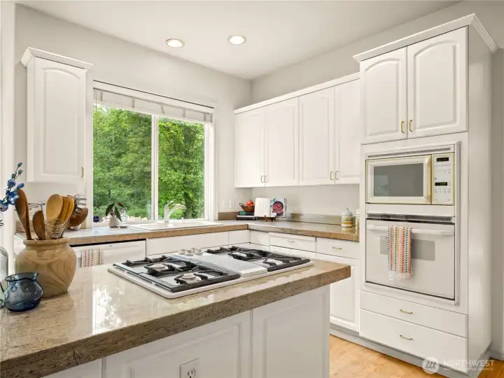 You have a great view of the back yard from the kitchen sink.