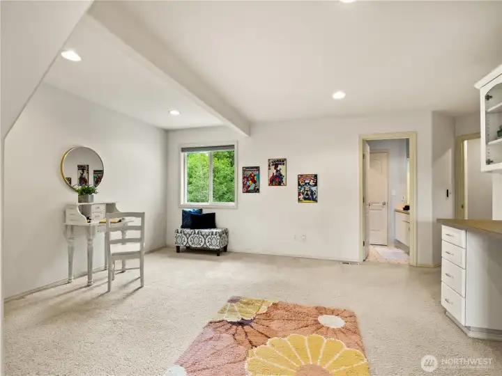 The bonus room connects to the walk-through bathroom.
