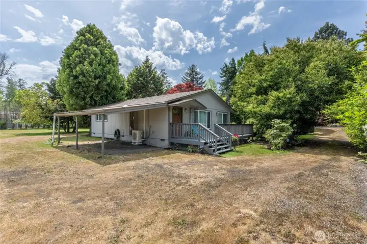 House front with the river behind me
