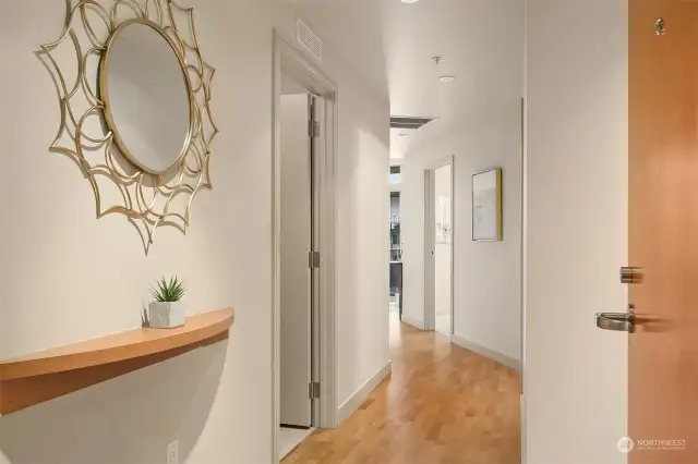 A welcoming hallway leads you through this spacious unit.