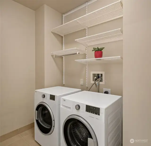 The personal laundry space with efficient shelving for easy organization.