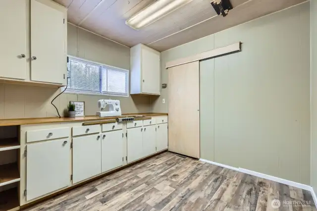 3rd bedroom/workshop with walk in closet.