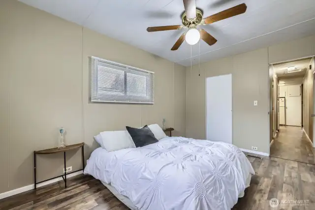 Primary bedroom with two walk in closets.