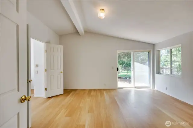 Primary bedroom suite. Door to the back yard! Private entry.