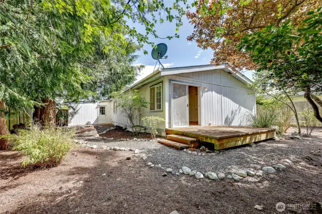 Here is the back of the house. Low maintenance yard ready for your creative touches.