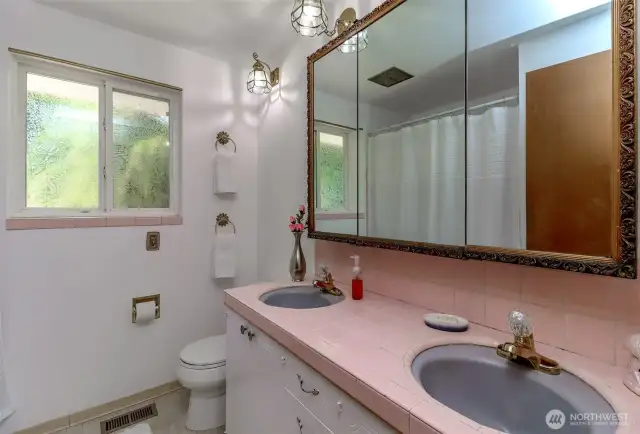 main bathroom with the original mid-century motife