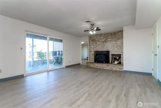 Downstairs family room with access to the patio and waterfront