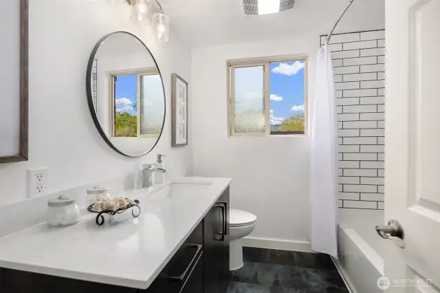 Renovated bathroom with heated tile floors