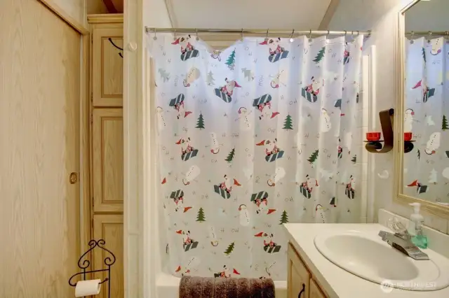 Full bathroom with storage