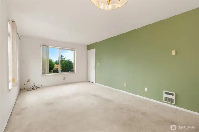 Another view of the Family Room! Door leads to covered Balcony!