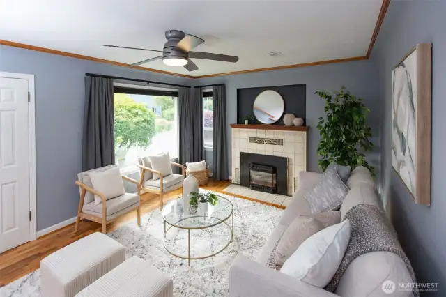 Corner windows allow wonderful natural light; gas fireplace will keep you cozy when the seasons change. Owner recently had chimney repointed, replaced chimney flue liners, new crown and multi-flu cap installed, along with regularly servicing fireplace.